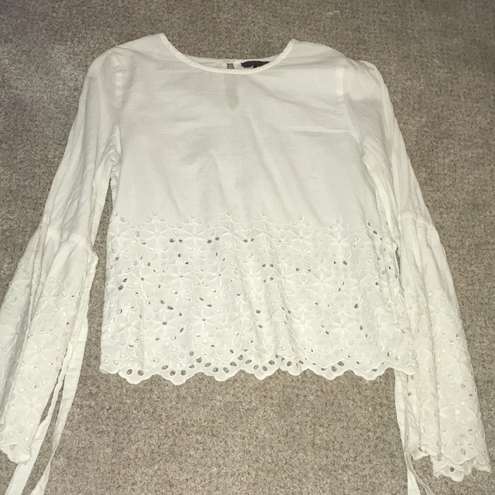 Long sleeve white dressy shirt.